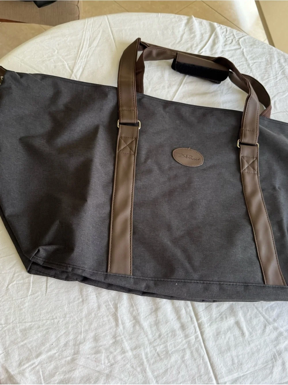 Bella Russo Canvas Duffel Bag 29”. Unisex. Dark Gray with Brown Handles